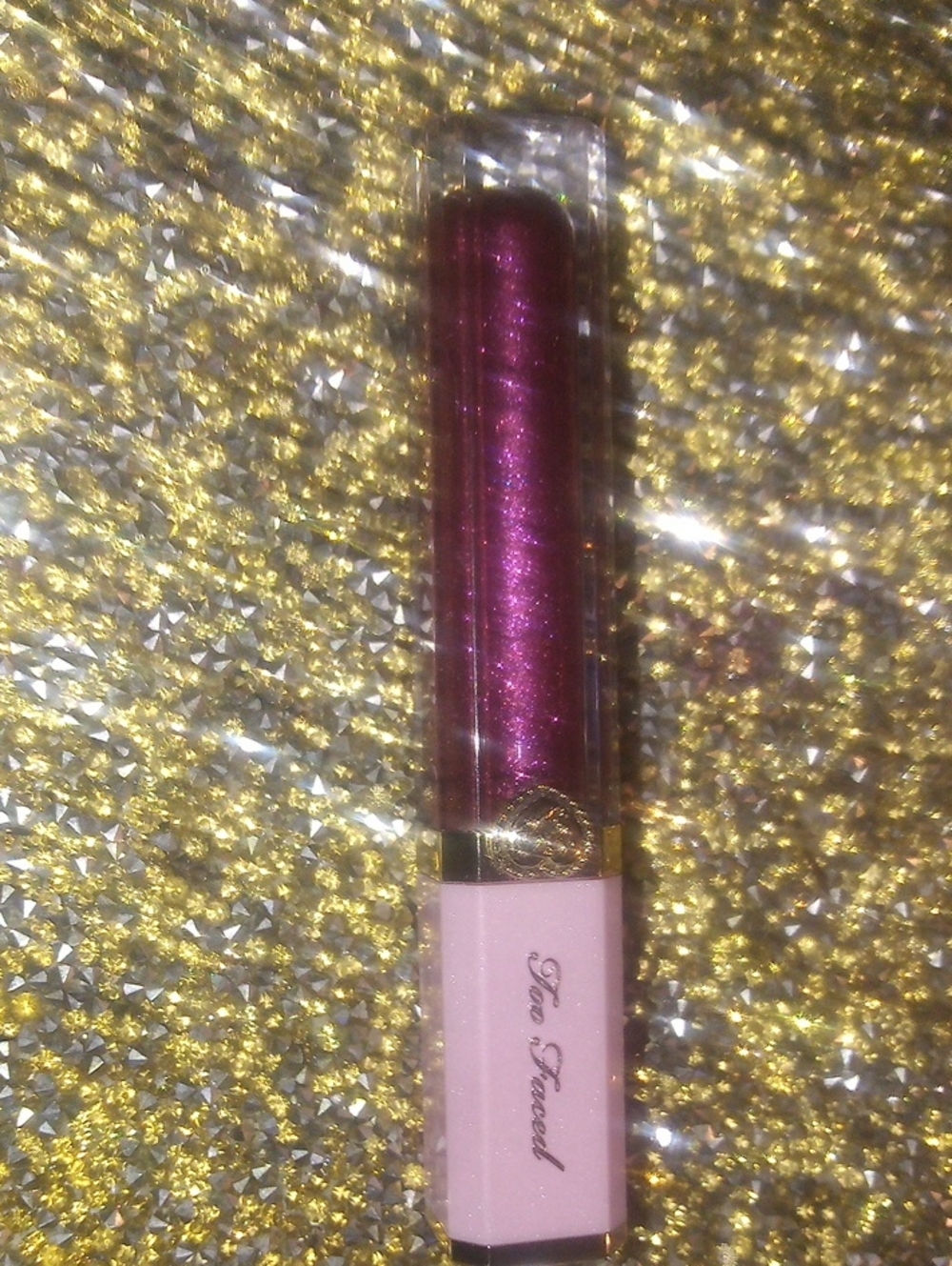 Too Faced Dual-Tone Lip Gloss — Light Pink Base with Shimmering Plum